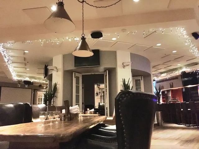Restaurant and bar at the Château Montebello, with long wooden tables