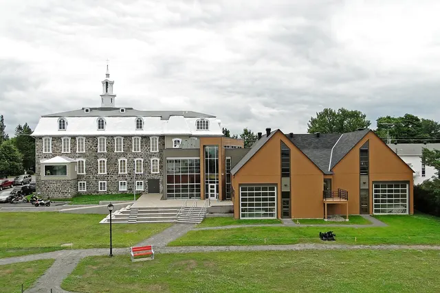 Musée maritime du Québec in L'Islet, a stone building and a wooden pavilion