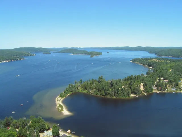 Aerial view of Lac Simon with the sandy point of Île du Canard Blanc