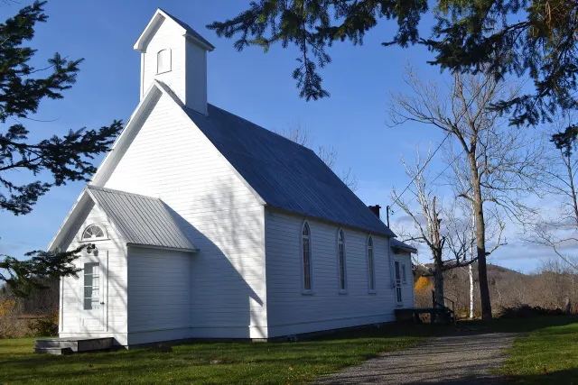 The small white wooden St. John's church in Papineauville